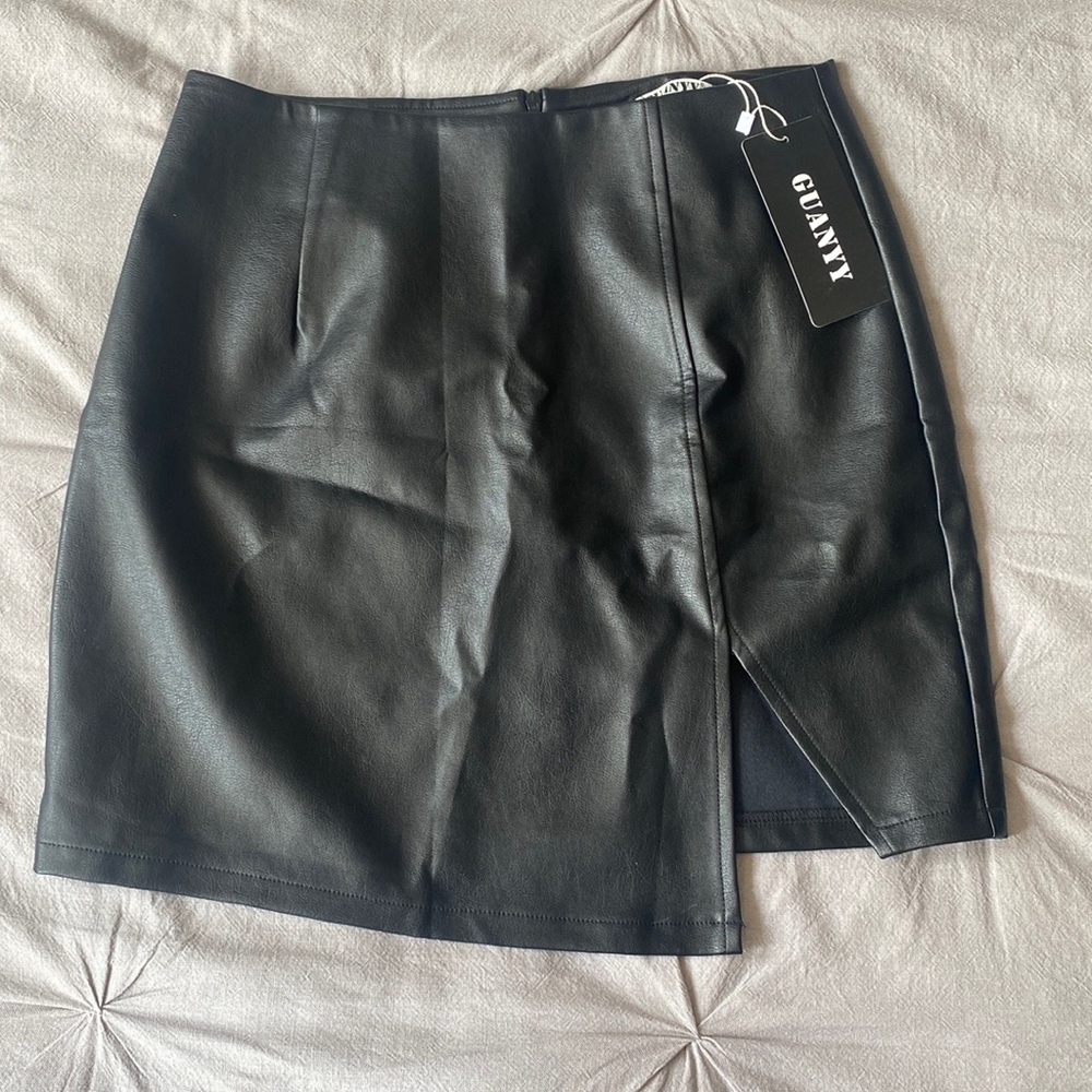 Asymmetrical split faux leather skirt